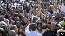 In this 7 Oct 2010 file photo, President Barack Obama greets people after speaking at a campaign rally for Maryland Gov. Martin O'Malley at Bowie State University in Bowie, Md.