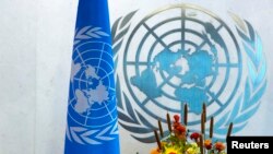 ស្លាកសញ្ញា និង​ទង់ជ័យ​​អង្គការសហប្រជាជាតិ​។​