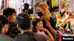 FILE - Australian actor Nicole Kidman works on a scene during filming for the Amazon Prime series "Expats" in Hong Kong, China, August 23, 2021.