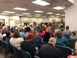A crowd fills a South Carolina Senate hearing room as a Senate committee considers a strict "heartbeat" abortion ban in Columbia, South Carolina, Nov. 5, 2019.