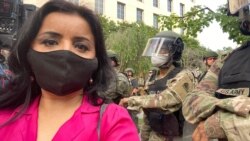 Navbahor Imamova, from the VOA Uzbek Service, reports on protests in Washington, D.C. (VOA/Navbahor Imamova)