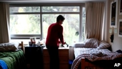 A co-ed dorm at UCLA in Los Angeles. A sleep expert says getting enough sleep is important to getting good grades. But students don't always accept his advice. (AP Photo/Jae C. Hong)