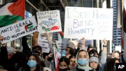 Hundreds of protesters gather and protest in support of Palestinians in front of the Consulate General of Israel on May 12, 2021 in Chicago.