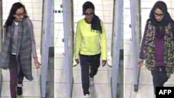 FILE - A combination of handout CCTV pictures received from the Metropolitan Police Service shows, from left, British teenagers Kadiza Sultana, Amira Abase and Shamima Begum passing through security barriers at Gatwick Airport, south of London, on Feb. 17, 2015.
