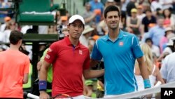 Djoković i Nišikori pre meča danas u Majamiju