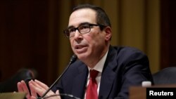 FILE - Steven Mnuchin testifies before his Senate Finance Committee confirmation hearing, Jan. 19, 2017.
