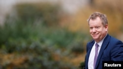 Britain's to EU adviser David Frost walks outside Downing Street in London, Feb. 24, 2021.