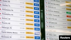 Passengers wait for the resumption of flights at O'Hare International Airport