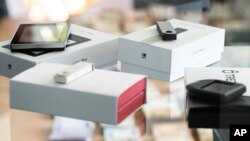 Evidence is presented, May 3, 2019 at a press conference in Wiesbaden, Germany, about the breaking up one of the largest online criminal trafficking operations allegedly responsible for international trafficking of drugs, as well as forged documents and other illegal materials.