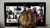 FILE - A student takes classes online using Zoom during the coronavirus outbreak, in El Masnou, north of Barcelona, Spain, April 2, 2020. 