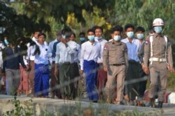 Students, who had been arrested for taking part in a demonstration against the military coup, are released from prison in Naypyidaw, Myanmar, Feb. 15, 2021.