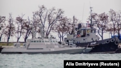 Ukrainian naval ships, which were recently seized by Russia's FSB security service, are seen anchored in a port in Kerch, Crimea November 28, 2018. REUTERS