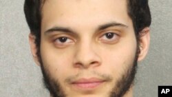 This booking photo provided by the Broward Sheriff's Office shows suspect Esteban Ruiz Santiago, 26, Jan. 7, 2017, in Fort Lauderdale, Fla. 