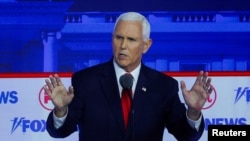 FILE PHOTO: Republican U.S. presidential candidates participate in first 2024 campaign debate in Milwaukee