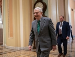 Senate Majority Leader Mitch McConnell, R-Ky., walks to the Senate chamber at the Capitol in Washington, Feb. 13, 2020.