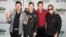 FILE - Eli Maiman, from left, Nicholas Petricca, Kevin Ray and Sean Waugaman of the band Walk the Moon pose for photographers.