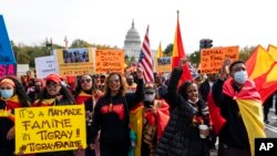 FILE - Exile Tigray community members and their supporters march to mark a year since Ethiopia Prime Minister Abiy Ahmed's administration started fighting against Tigray, the northernmost region in Ethiopia. at the U.S. Capitol, Nov. 4, 2021, in Washington.