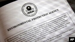 FILE - Proposals for the Environmental Protection Agency (EPA) in President Donald Trump's first budget are displayed at the Government Printing Office in Washington, March 16, 2017.