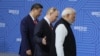 Kineski predsjednik Xi Jinping, ruski predsjednik Vladimir Putin i indijski premijer Narendra Modi dolaze na fotografiju tokom samita BRICS-a u Kazanju, Rusija, 23. oktobra 2024. godine.