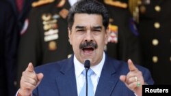 Venezuela's President Nicolas Maduro speaks during a news conference at Miraflores Palace in Caracas, Venezuela, March 12, 2020. (REUTERS/Manaure Quintero)