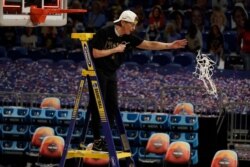 Stanford head coach Tara VanDerveer cuts down the net after the championship game against Arizona in the women's Final Four NCAA college basketball tournament, Sunday, April 4, 2021, at the Alamodome in San Antonio. Stanford won 54-53.