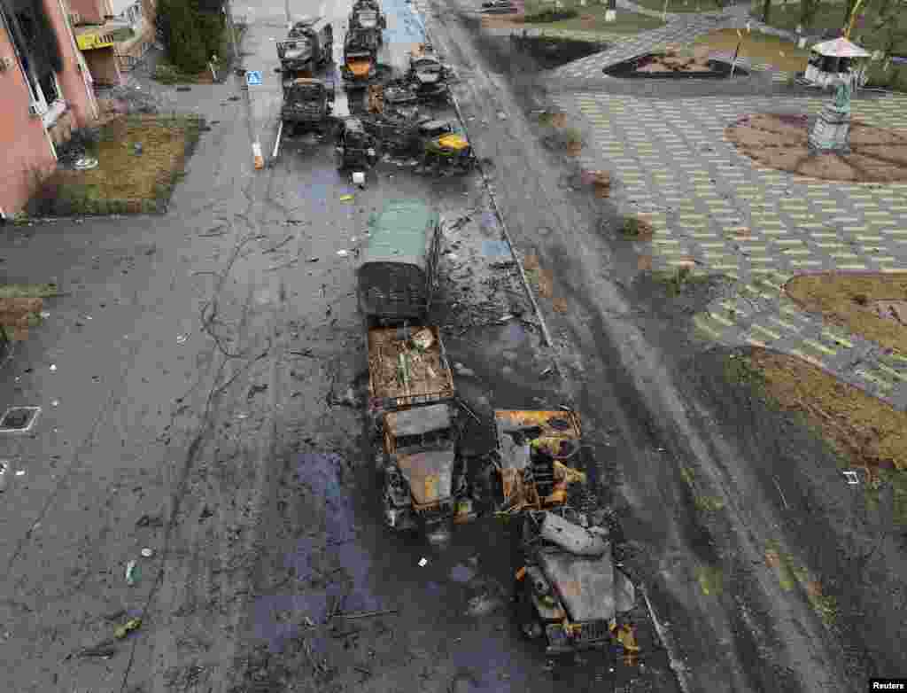 Destroyed Russian military vehicles are seen on a street in the settlement of Borodyanka in the Kyiv region as Russia&#39;s invasion of Ukraine continues, March 3, 2022.