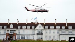 Presidential candidate Donald Trump leaves by his helicopter from the Turnberry golf course in Turnberry, Scotland, Aug. 1, 2015.