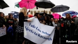 Yale Law students take part in a protest against U.S. Supreme Court nominee Brett Kavanaugh in front of the Supreme Court in Washington, U.S., Sept. 24, 2018. 