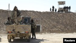 Syrian Democratic Forces gather in northern Deir al-Zor province ahead of an offensive against Islamic State militants, Syria, Feb. 21, 2017.