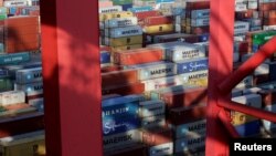 Containers are seen at the Yangshan Deep Water Port, part of the Shanghai Free Trade Zone, in Shanghai, China, Sept. 24, 2016. 