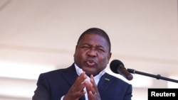 FILE - Mozambique's President Filipe Nyusi speaks during Armed Forces Day celebrations in Pemba, Mozambique, Sept. 25, 2021.