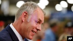 FILE - U.S. Interior Secretary Ryan Zinke speaks to reporters in Salt Lake City, Feb. 9, 2018.