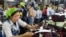 Cambodian garment workers work inside a factory in Phnom Penh, Cambodia, file photo. 