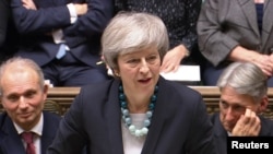 PM Inggris Theresa May di London, Inggris, 10 Desember 2018.