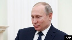 Le président russe Vladimir Poutine lors d'une réunion au Kremlin à Moscou, le 15 février 2018.