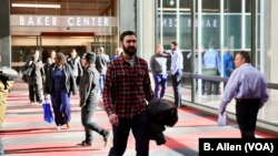 Local business owner Brad Rohles walks to work across the Minneapolis Skyway. Rohles estimates the Skyway allows him to spend just a few minutes outside in the harsh winter weather, while still maintaining an active lifestyle. 