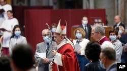 Pope Francis celebrates Mass in St. Peter's Basilica at the Vatican, May 31, 2020.
