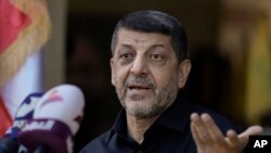 모하메드 아피프 헤즈볼라 수석 대변인이 2024년 10월 22일 레바논 다히예에서 기자회견을 하고 있다.