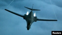 FILE 0 A B-1B Lancer from the U.S. Air Force 28th Air Expeditionary Wing heads out on a combat mission in support of strikes on Afghanistan.