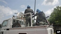 United Nations soldiers from Senegal patrol the streets of Abidjan, Ivory Coast, Dec 9, 2010 (file photo)