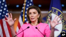 Speaker of the House Nancy Pelosi, D-Calif., updates reporters on Democratic efforts to pass President Joe Biden's 'Build Back Better' agenda, at the Capitol in Washington, Sept. 23, 2021. 
