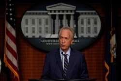 FILE - Louisville Mayor Greg Fischer speaks during a news conference in Louisville, Kentucky, Sept. 15, 2020.