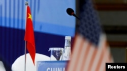 The Chinese and U.S. national flags are seen before the start of a Treaty on the Non-Proliferation of Nuclear Weapons conference with the U.N. Security Council's five permanent members, in Beijing, January 30, 2019.