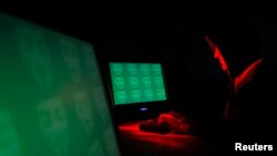 컴퓨터 해커를 묘사한 일러스트.