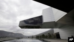 The Union of South American Nations, UNASUR, building stands forlorn near Quitom Ecuador, Wednesday, Dec. 19, 2018. (AP Photo/Dolores Ochoa)