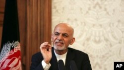 An injured demonstrator is been helped by another after clashing with riot police during the so-called &quot;mother of all marches&quot; against Venezuela&#39;s President Nicolas Maduro in Caracas.