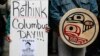 FILE - Diane Douglas Willard, right, demonstrates with her daughter, Gianna Willard, both Haida tribal members from Ketchikan, Alaska, during a Native American protest against Columbus Day.