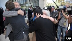 A Hindu devotee gets showered as part of a cleaning ritual before his pilgrimage during the Thaipusam festival in Kuala Lumpur, Malaysia.