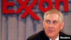 FILE - Chairman and chief executive officer Rex W. Tillerson speaks at a news conference in Dallas, Texas. 