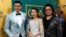 Author Kevin Kwan (R) and cast members Henry Golding and Constance Wu pose at the premiere for "Crazy Rich Asians" in Los Angeles, California, U.S., August 7, 2018. 